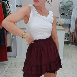 Top TACHUELAS